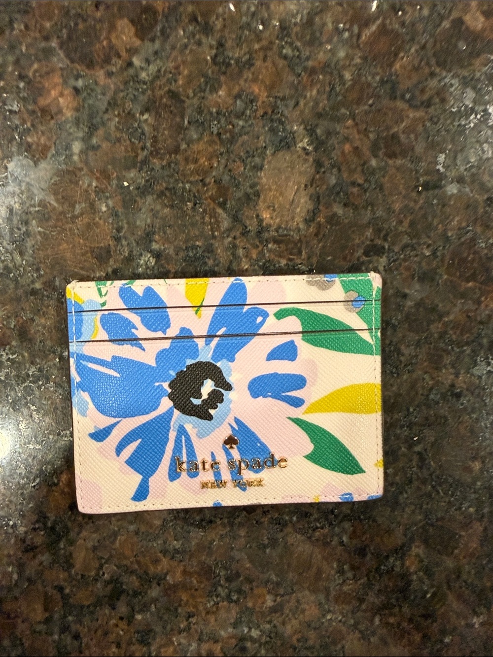 NWOT never used kate spade Pink Floral Card Holder with Blue and Green Accents